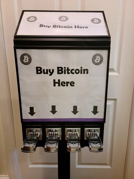 BTC vending machine bitcoin. insert coins change and it dispenses BTC